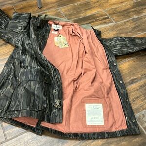 Brand New with tags.  Tom Beckbe Tenshaw Jacket.  Medium.  Mossy Oak Bottomland